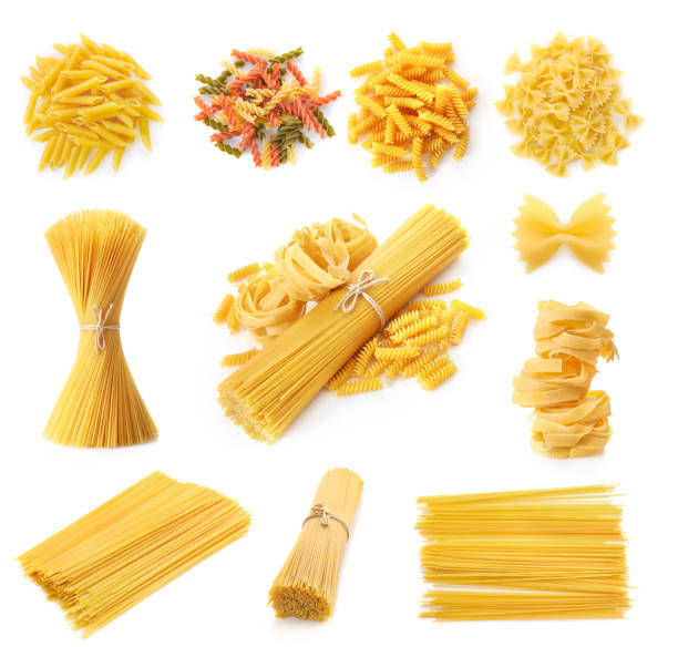 istock Set of raw pasta isolated on white background. Top view. 1392801505