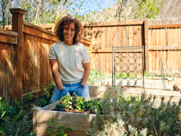 istock Woman in a Backyard Garden 1392804164