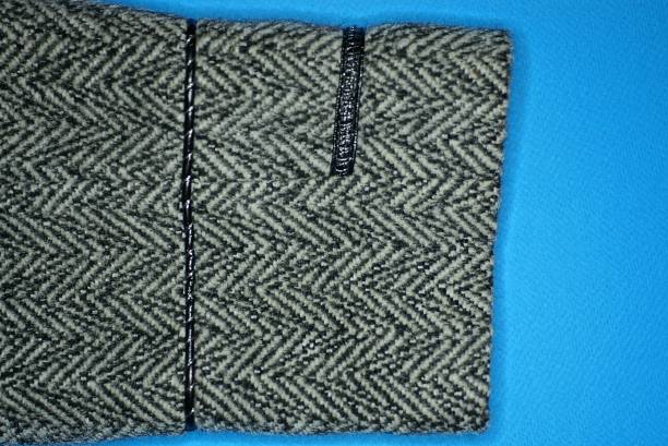 istock one long gray sleeve of a woolen jacket 1392804963