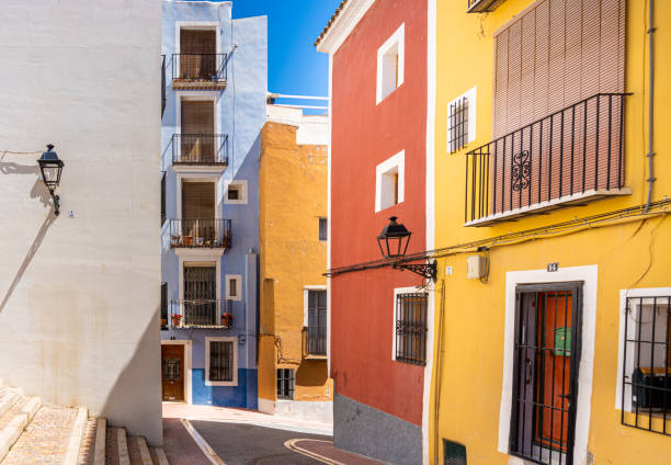 istock Touristic town with colored houses and buildings 1392804980