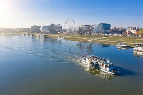 River tram water public transport for tourist attractions at the Visla river. ballon and Ferris wheel. from Panorama in the morning mist. aerial view from above