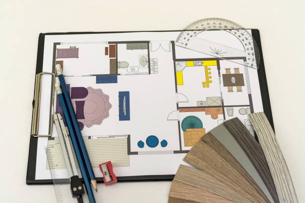 istock house blueprint with wooden vinyl sampler on desk 1392811779