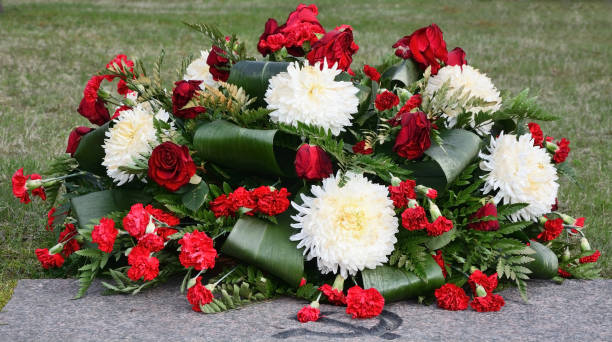 istock Pinks flowers at the memorial 1392815004