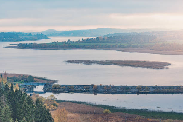 istock Autumn countryside view by the lake. 1392817025