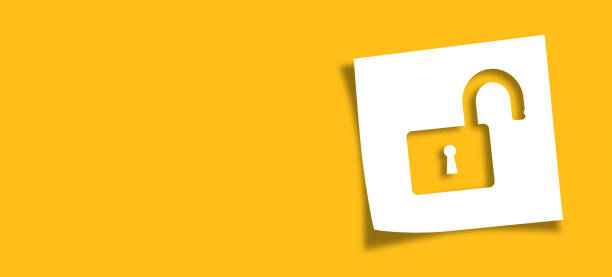 istock Note paper with unlock sign on panoramic yellow background 1392819640