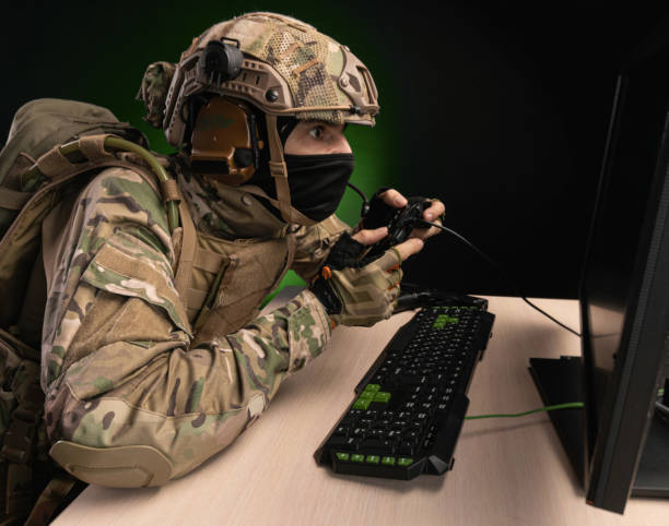 istock a military soldier at a computer is conducting a cyber war 1392824400