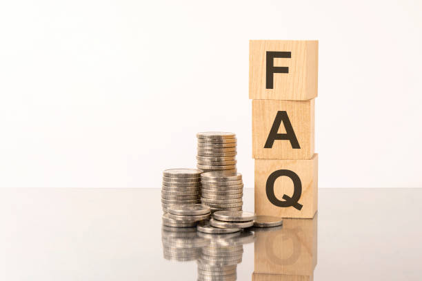 istock FAQ - Frequency Asked Questions - acronym on wooden cubes on white background with coins 1392824867