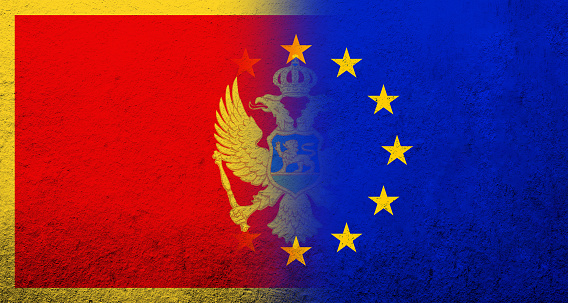 Flag of the European Union with National flag of Montenegro. Grunge background