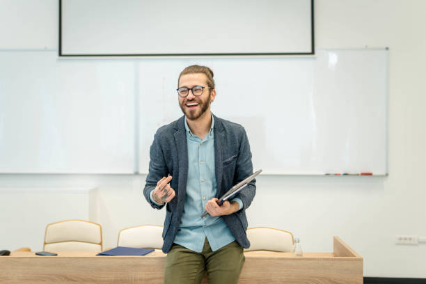 istock Young man in front of whiteboard 1392834215