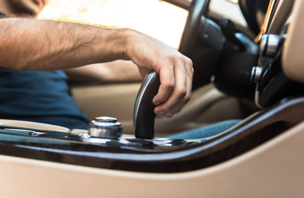 istock man driver shifting the gear stick 1392836948