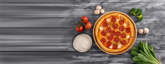 big bright tasty juicy pizza on black background