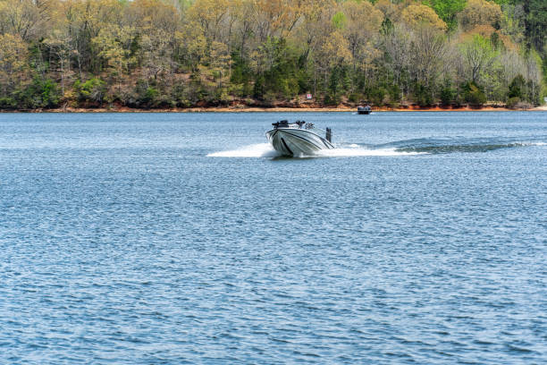 istock Bass boat running down the lake 1392844116