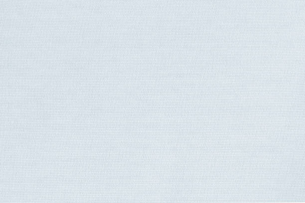 istock Cotton silk fabric wallpaper texture pattern background in light pastel pale grey blue 1392846493