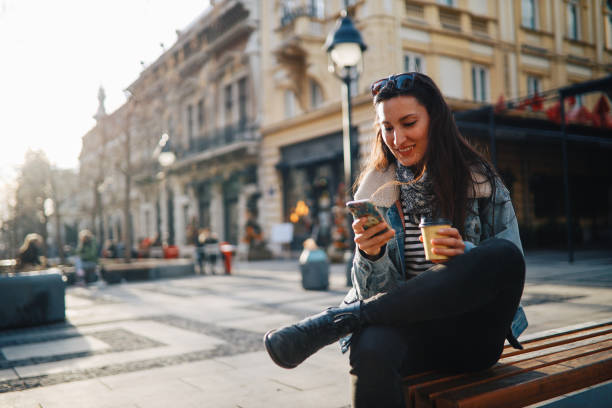 istock woman having a coffee break in the city 1392852913