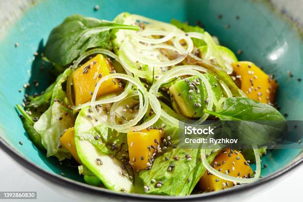 Fresh Healthy Food Green Salad With Avocado Mango Vegetarian Dish For Restaurant On White Background Healthy Organic Vegan Food Healthy Vegetarian Lunch Detox Salad For Diet Eat Less Meat Stock Photo - Download Image Now