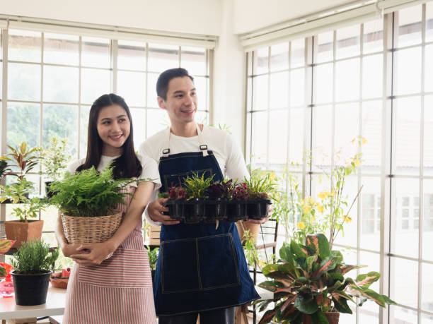 istock gardener young Asian 1392861795