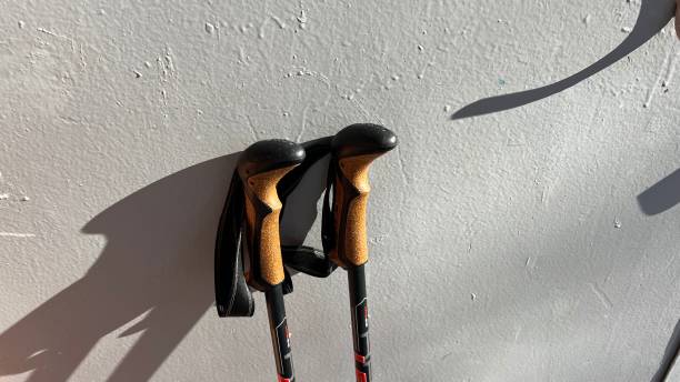 istock Nordic walking sticks by the wall 1392865965