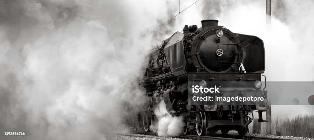 Close up old Steam train in smoke Old Steam Locomotive Steam Train Stock Photo