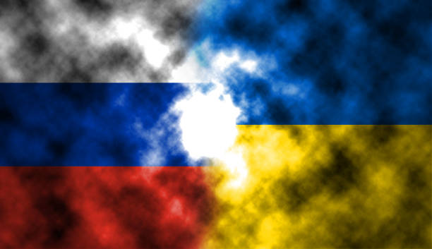 istock Russian flag and Ukrainian flag 1392869467
