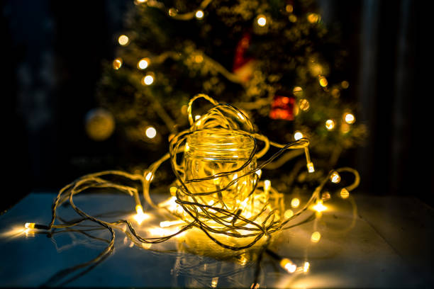 istock burning candle light during new Christmas evening 1392871124