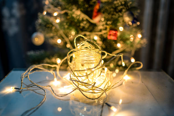 istock burning candle light during new Christmas evening 1392871127