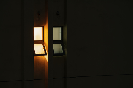 A lighted window at night