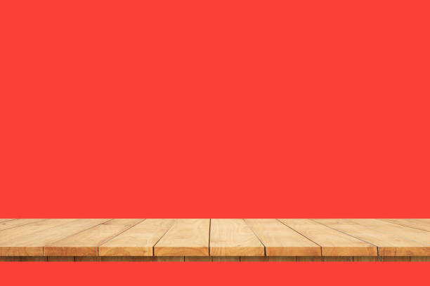istock Empty wooden deck table over Color wallpaper background for present product. 1392875006