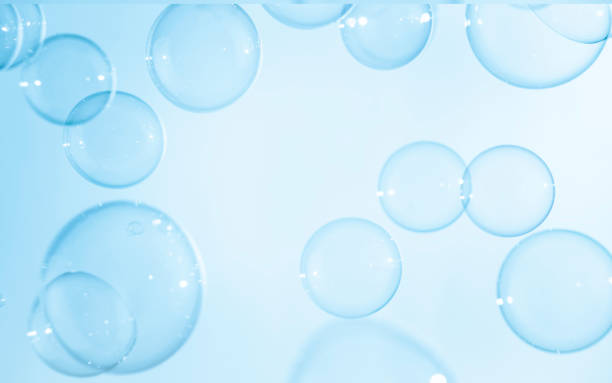 istock Transparent Blue Soap Bubbles Background. Soap Suds Bubbles Water 1392880748