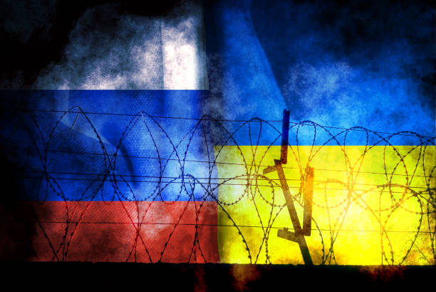 istock Russian flag and Ukrainian flag 1392881451