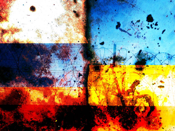 istock Russian flag and Ukrainian flag 1392882445