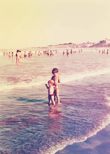 Photo of Young brothers at the sea.