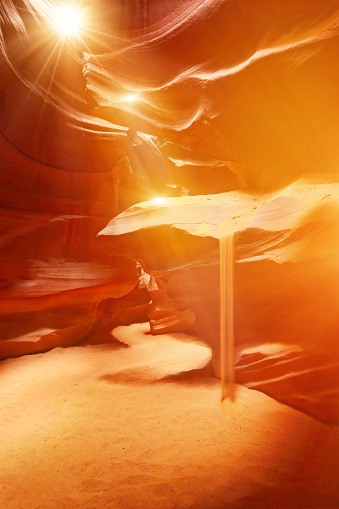 Antelope Canyon with sunbeams and falling sand