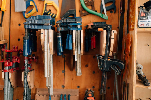 istock Various carpenter hand tools hanging on the wall in the carpentry workshop 1392888447