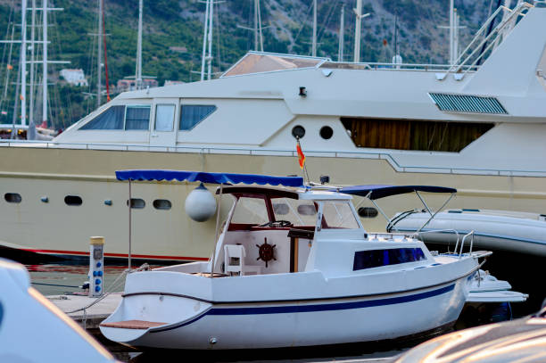 istock White yachts at the pier 1392889472