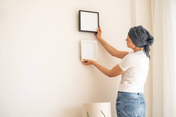 istock A wooden frame with empty space in women's hands 1392889741