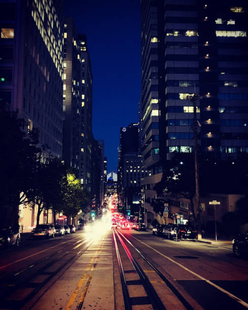 Night in  San Francisco, throught the lights of the city with a dark blue sky