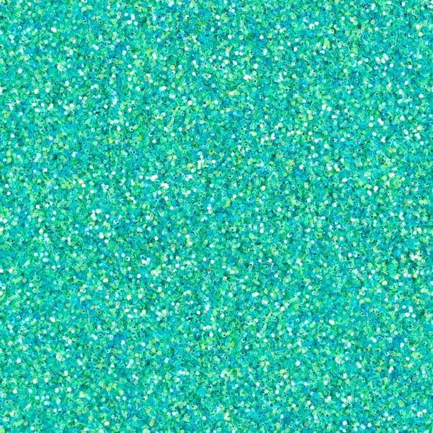 istock Turquoise glitter, sparkle confetti. Christmas seamless pattern. 1392890974