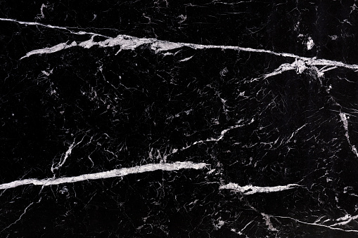 Nero Marquina - polished natural marble stone slab in black and white color, texture for perfect interior, background or other design project.