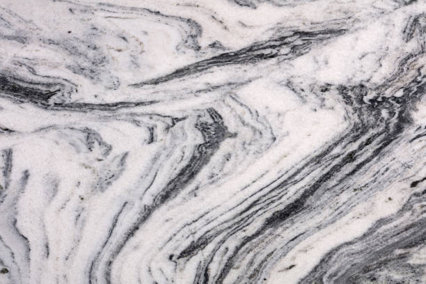 istock Stylish Volcano White, grey granite texture in classic style. 1392891013