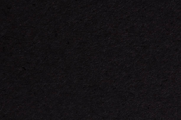 istock Black paper texture. Extremely high resolution photo. 1392891713