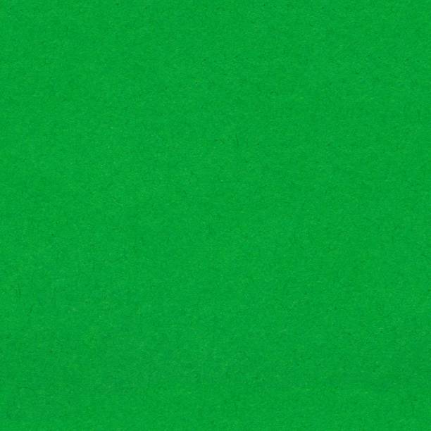 istock Green paper texture. Seamless square background, tile ready. 1392891750