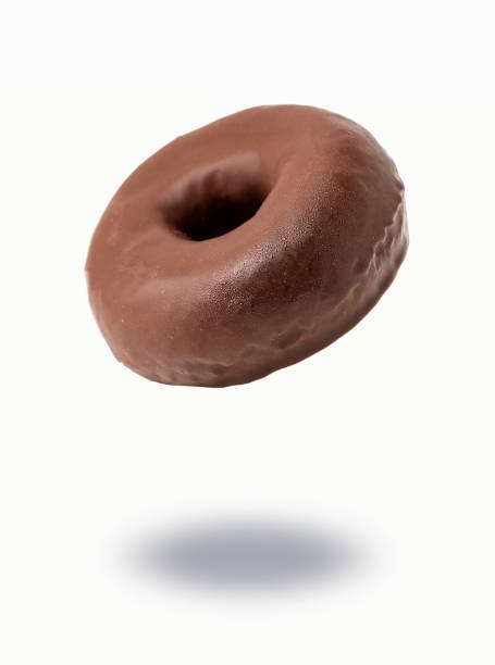 istock chocolate donut floating in the air 1392896267