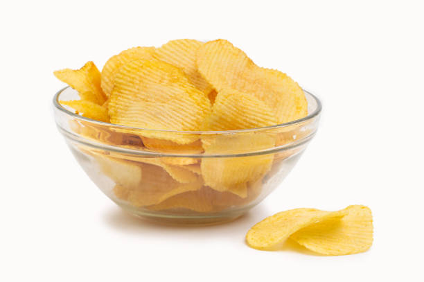 istock wavy potato chips in glass bowl 1392896309