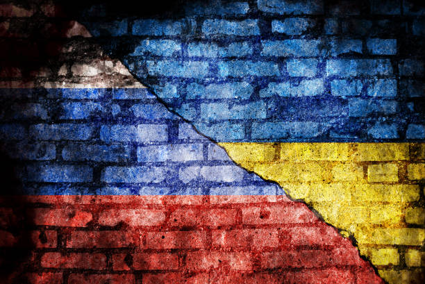 istock Russian flag and Ukrainian flag 1392896459