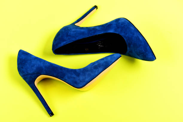 istock Pair of blue suede high heel shoes 1392897247