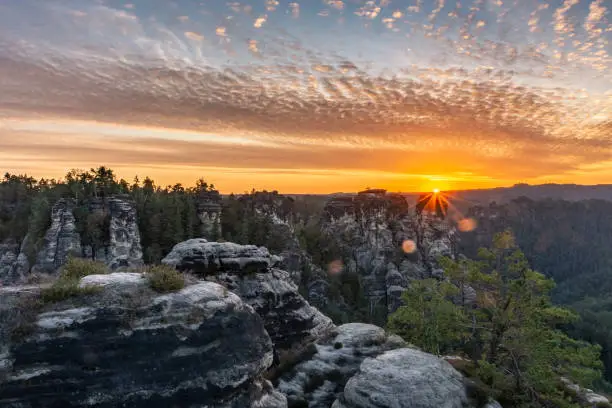 Amazing sunrise over the karst mountains of the Saxon Switzerland National Park, Germany