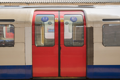 A London Underground tube train carriage with doors closed