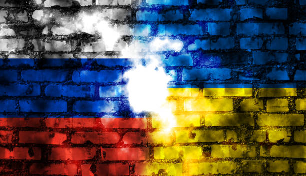 istock Russian flag and Ukrainian flag 1392902706
