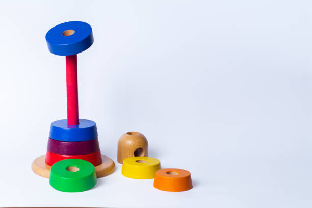 istock wooden pyramid tower from rainbow blocks 1392903410
