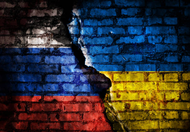 istock Russian flag and Ukrainian flag 1392905174